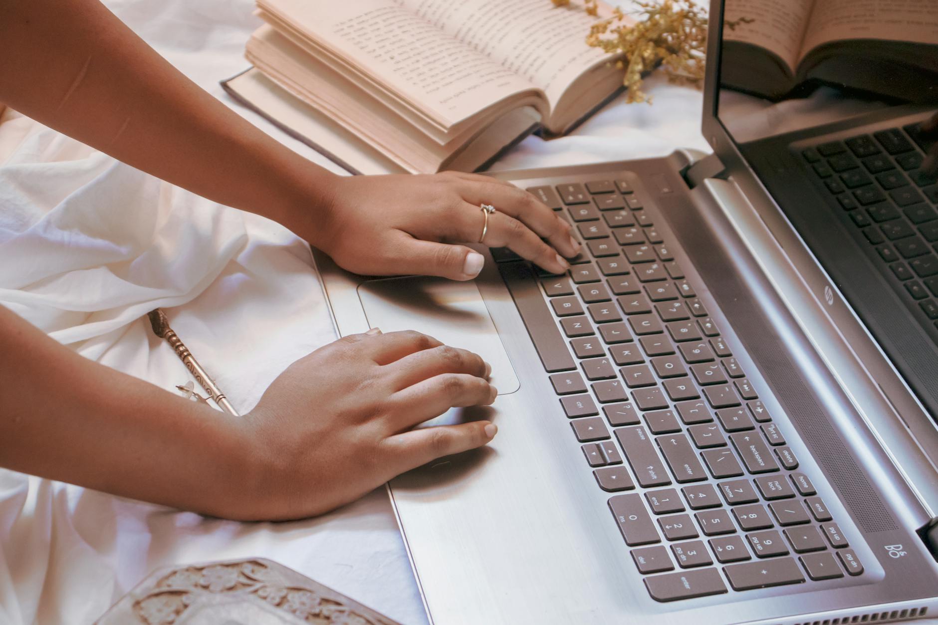 woman hands on laptop